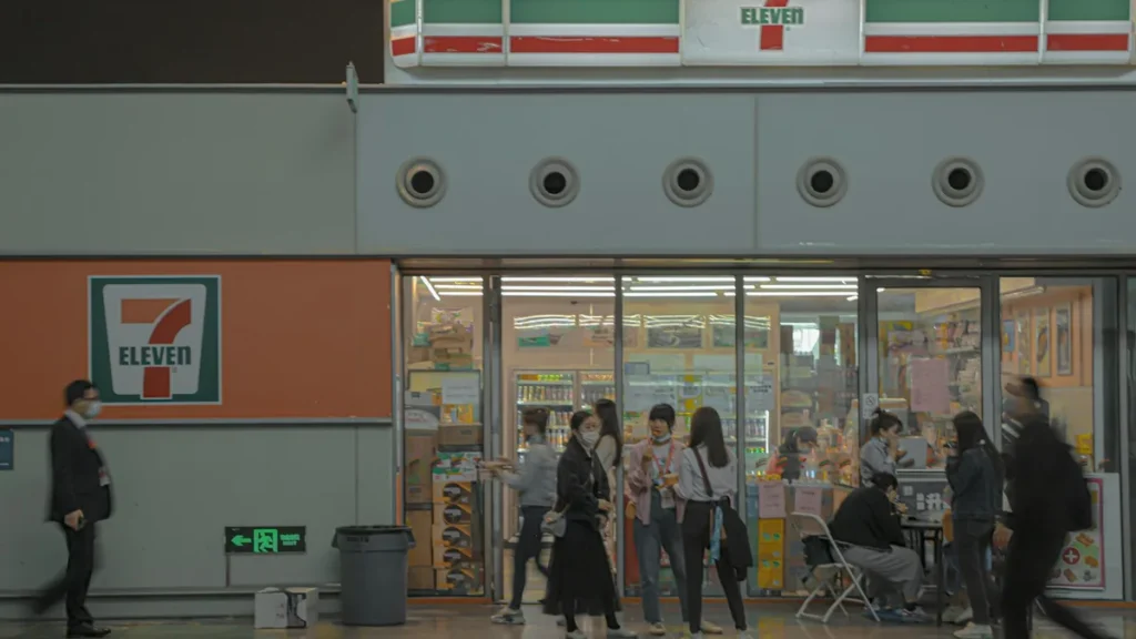 Korean convenience store interior with shelves of pork-free snacks and rice triangles, Itaewon Seoul